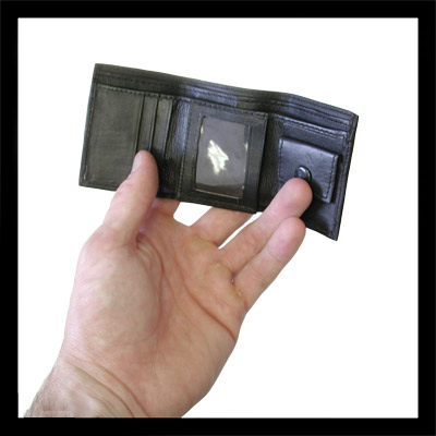 Comedy Mini Wallet by Tom Vorjohan held open in hand