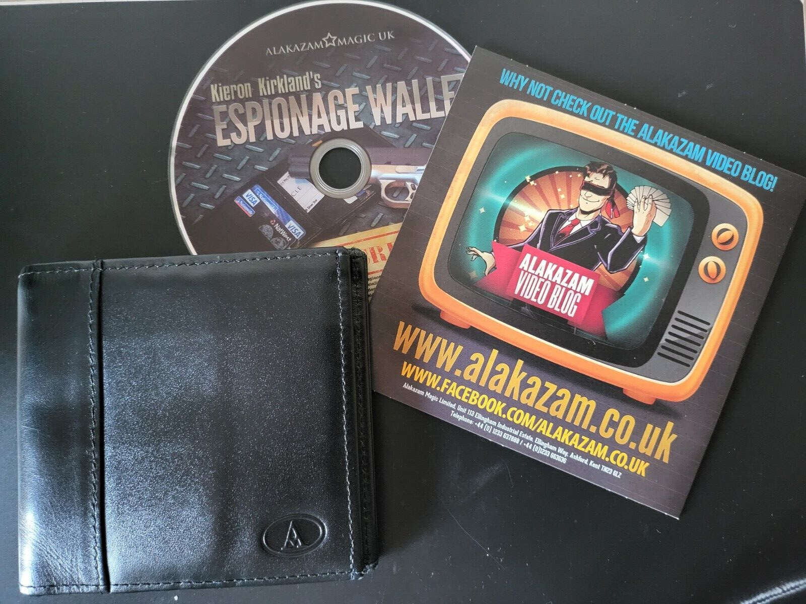 Espionage wallet by Alakazam with DVD and rear view of box