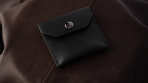 FPS Coin Wallet by Brent Braun and The Magic Firm closed on brown background