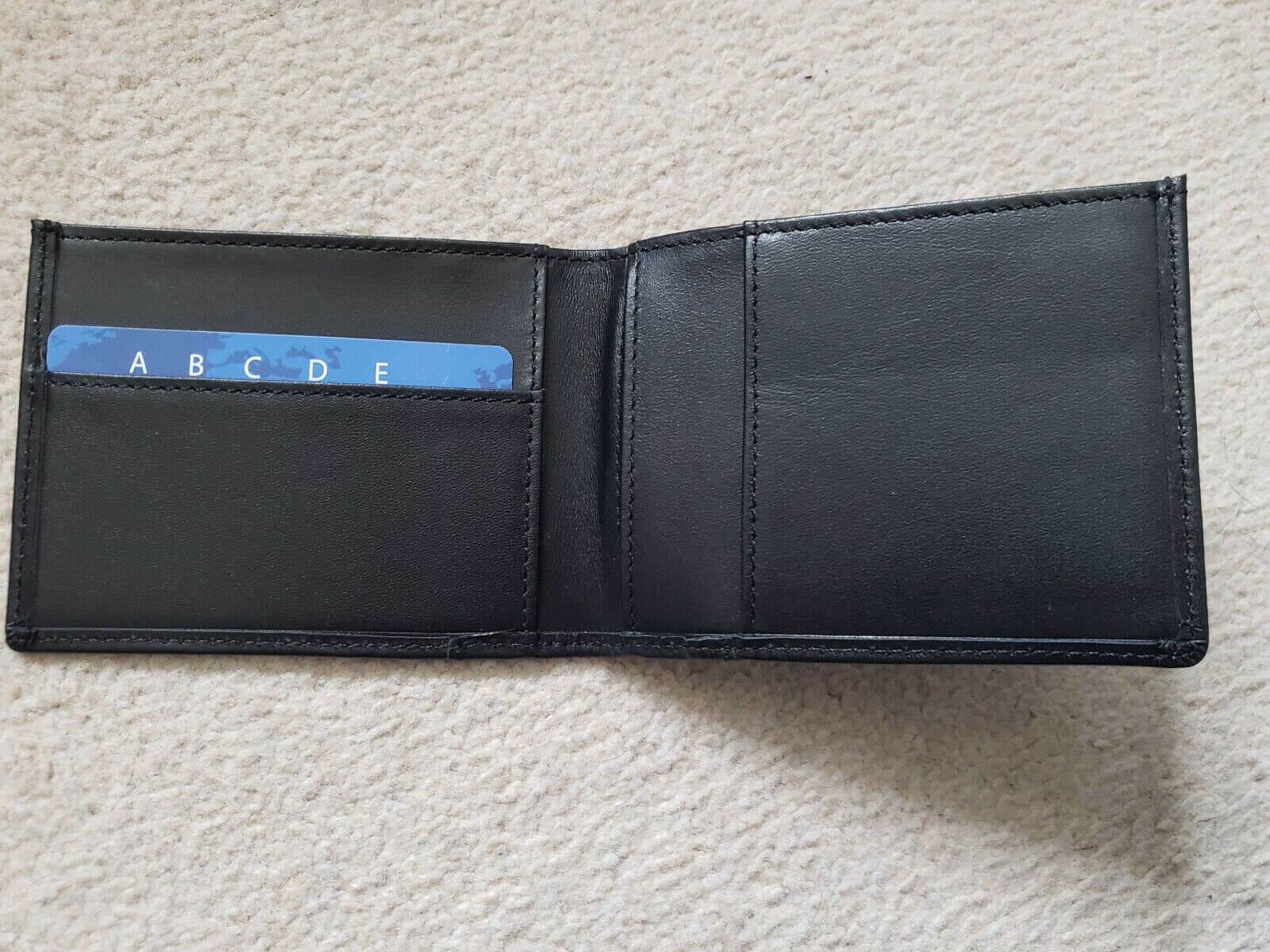 Minimal Wallet by Alan Wong & Pablo Amira in open position with blue card inside