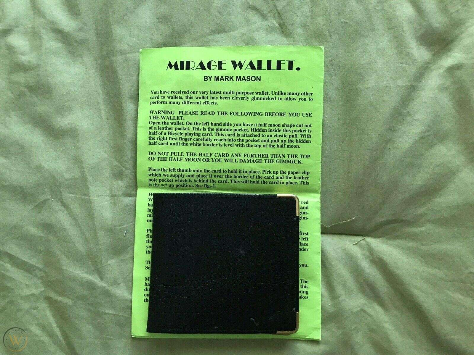 Mirage Wallet by Mark Mason shown closed on yellow instruction sheet