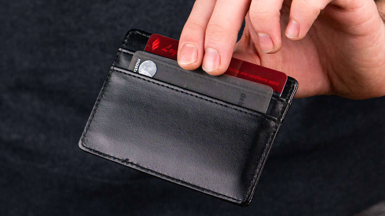 The Radar Wallet by David Howarth held in fingertips with cards inside