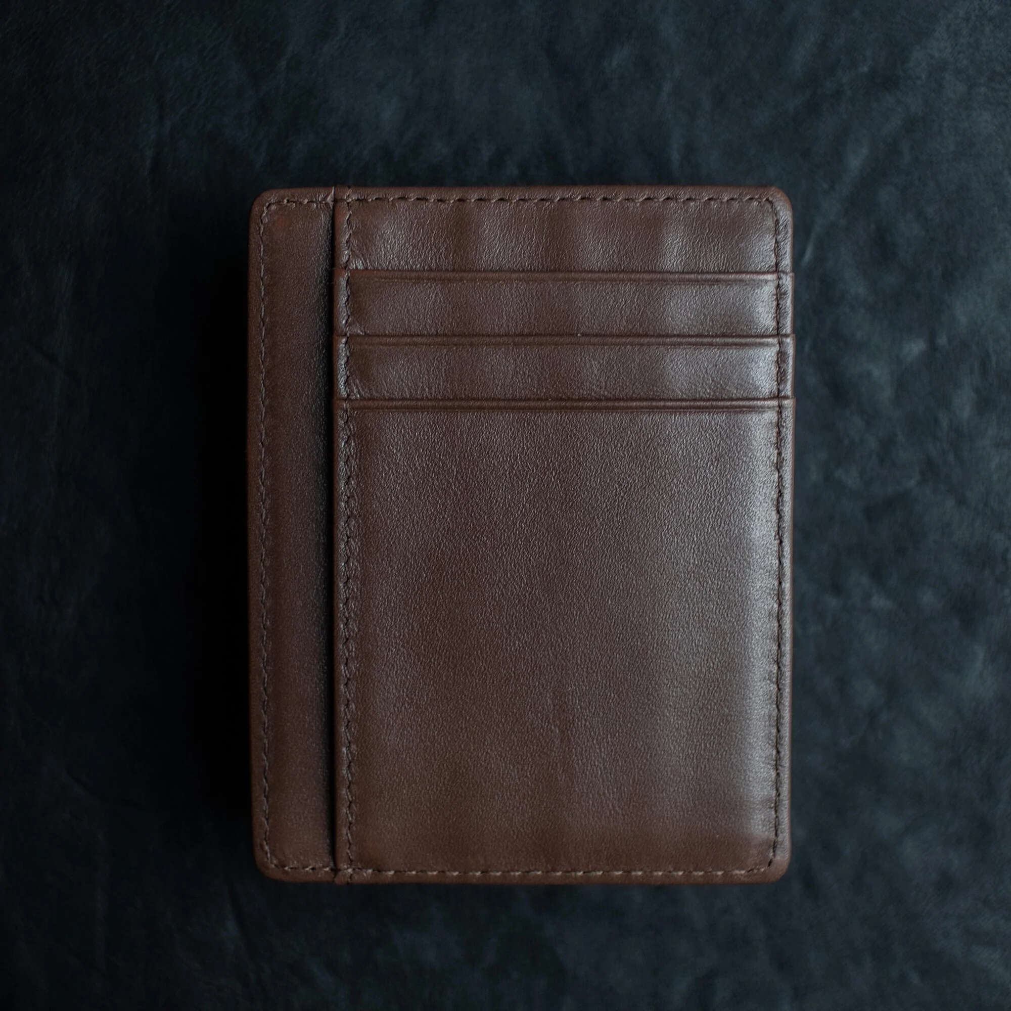Brown Shadow Wallet by Dee Christopher on brown surface showing ID Window