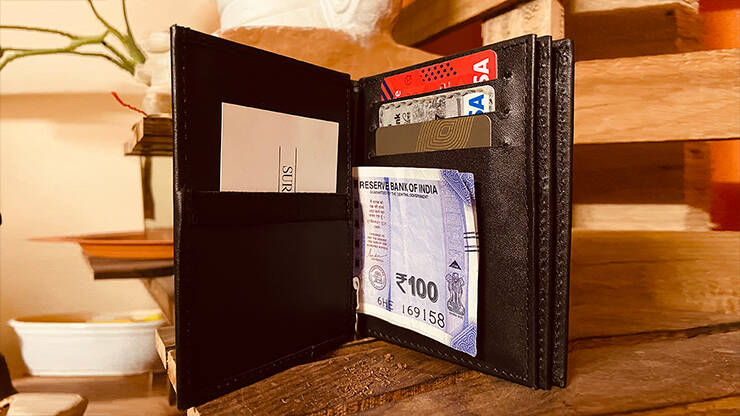 The Climax Wallet by Surya Kumar open with contents inside
