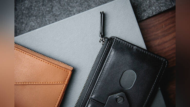 The edge wallet by TCC black and brown showing zips