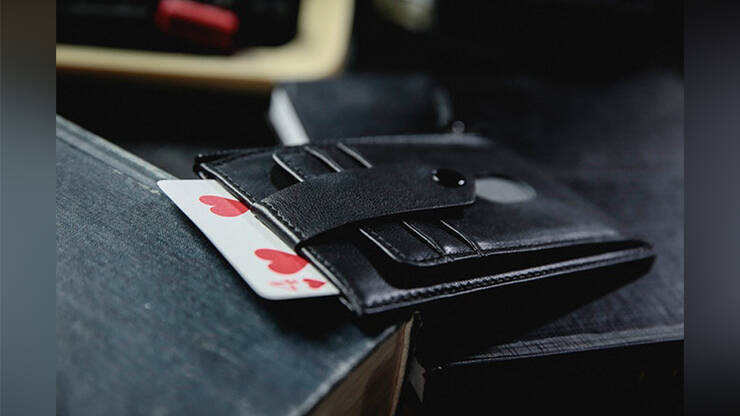 The edge wallet by TCC with playing card partially inserted