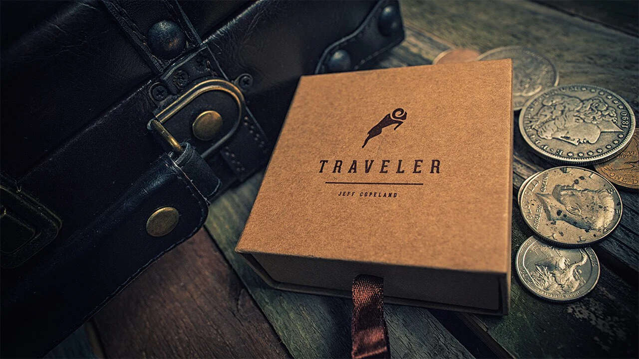 Traveler by Jeff Copeland box next to coins