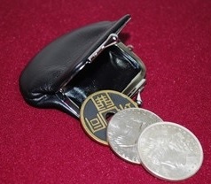 Coin Purse (Silver Frame - Large) by Ton Onosaka shown open with coins and chinese coin on mouth of purse