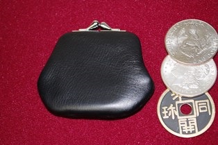 Coin Purse (Silver Frame - Large) by Ton Onosaka with chinese coin  and silver coins next to it on red background