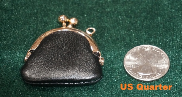Coin Purse (Gold Frame - Mini) by Ton Onosaka shown closed next to US Quarter coin