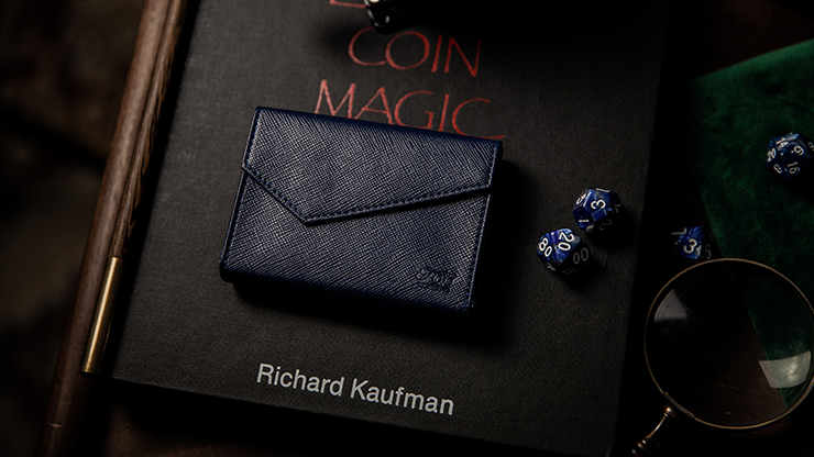 Luxury Leather Playing Card Carrier by TCC on top of coin magic by Richard Kaufman